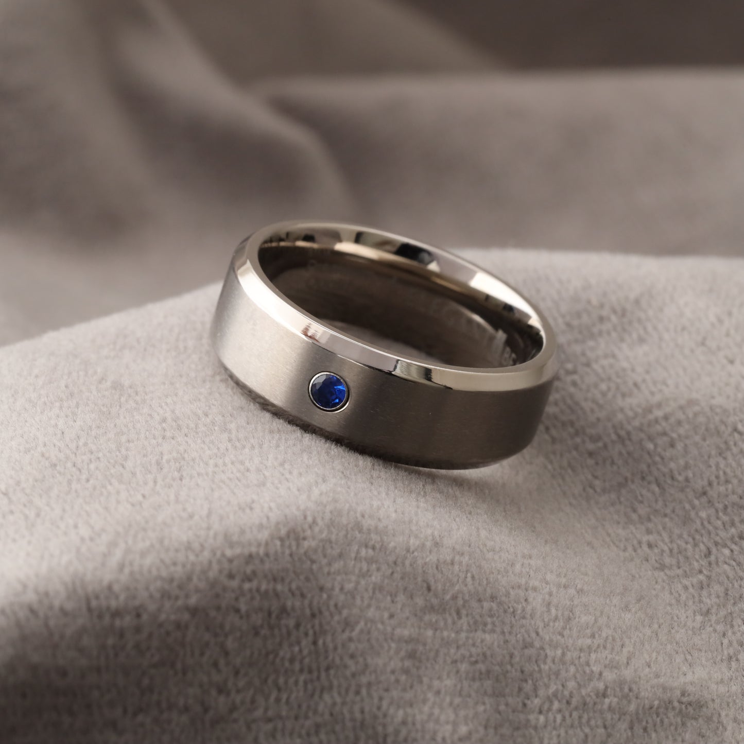 A334 Silver Titanium Ring with Blue Zircon - 8mm Width - Elegant Simplicity