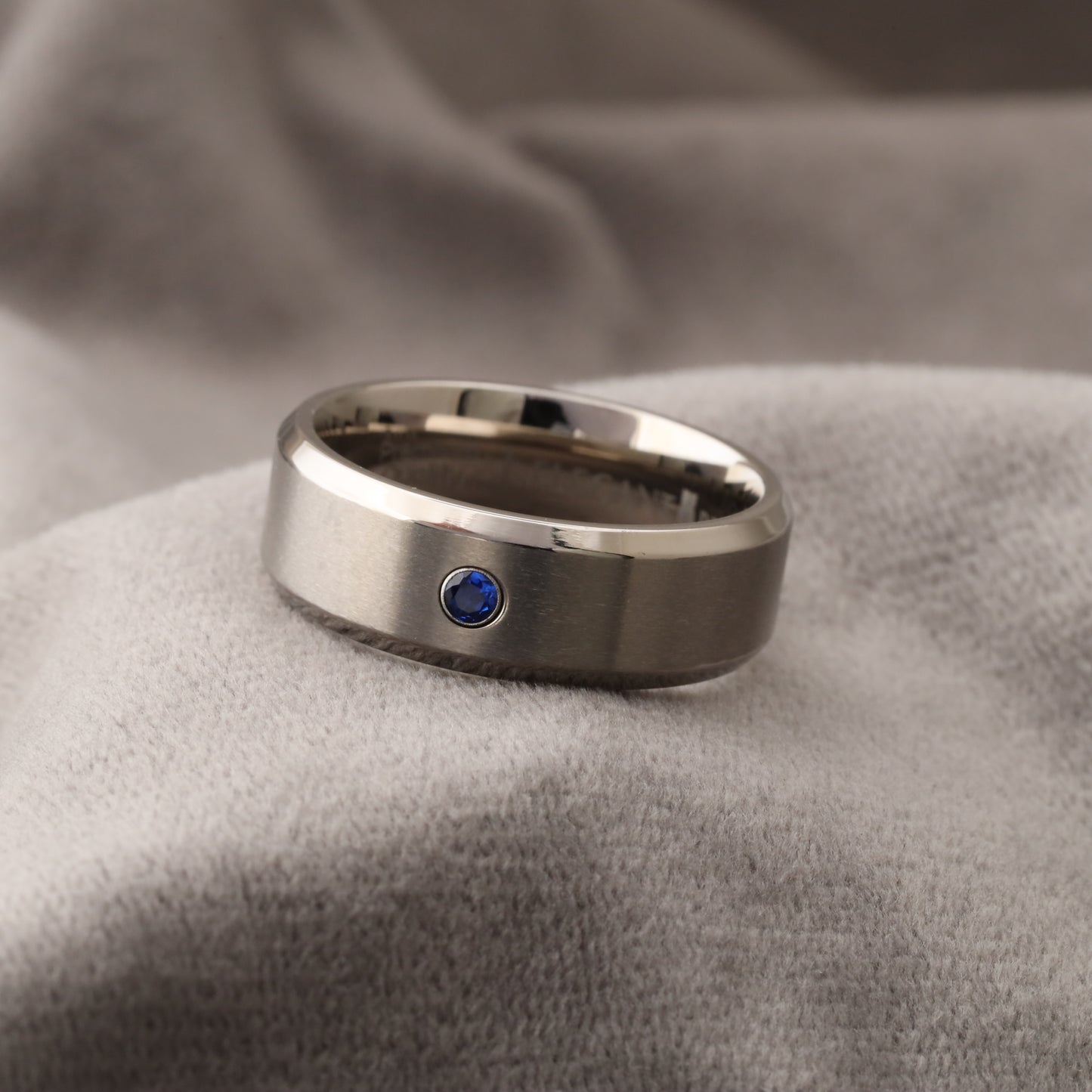 A334 Silver Titanium Ring with Blue Zircon - 8mm Width - Elegant Simplicity