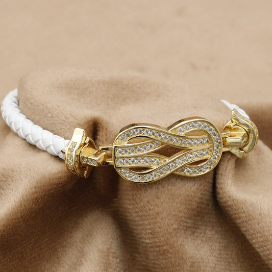 White Braided Leather Bracelet Gold Crystal Infinity Knot Clasp KAR57 – إسوارة جلد أبيض عقدة