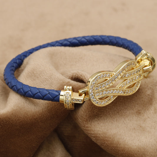 Blue Braided Leather Bracelet Gold Crystal Infinity Knot Clasp KAR67 – إسوارة جلد أزرق عقدة